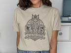 T-shirt with graphic of crowned Maine Coon cat, mountains, and text "MAINE COON WHISKERS & ATTITUDE".