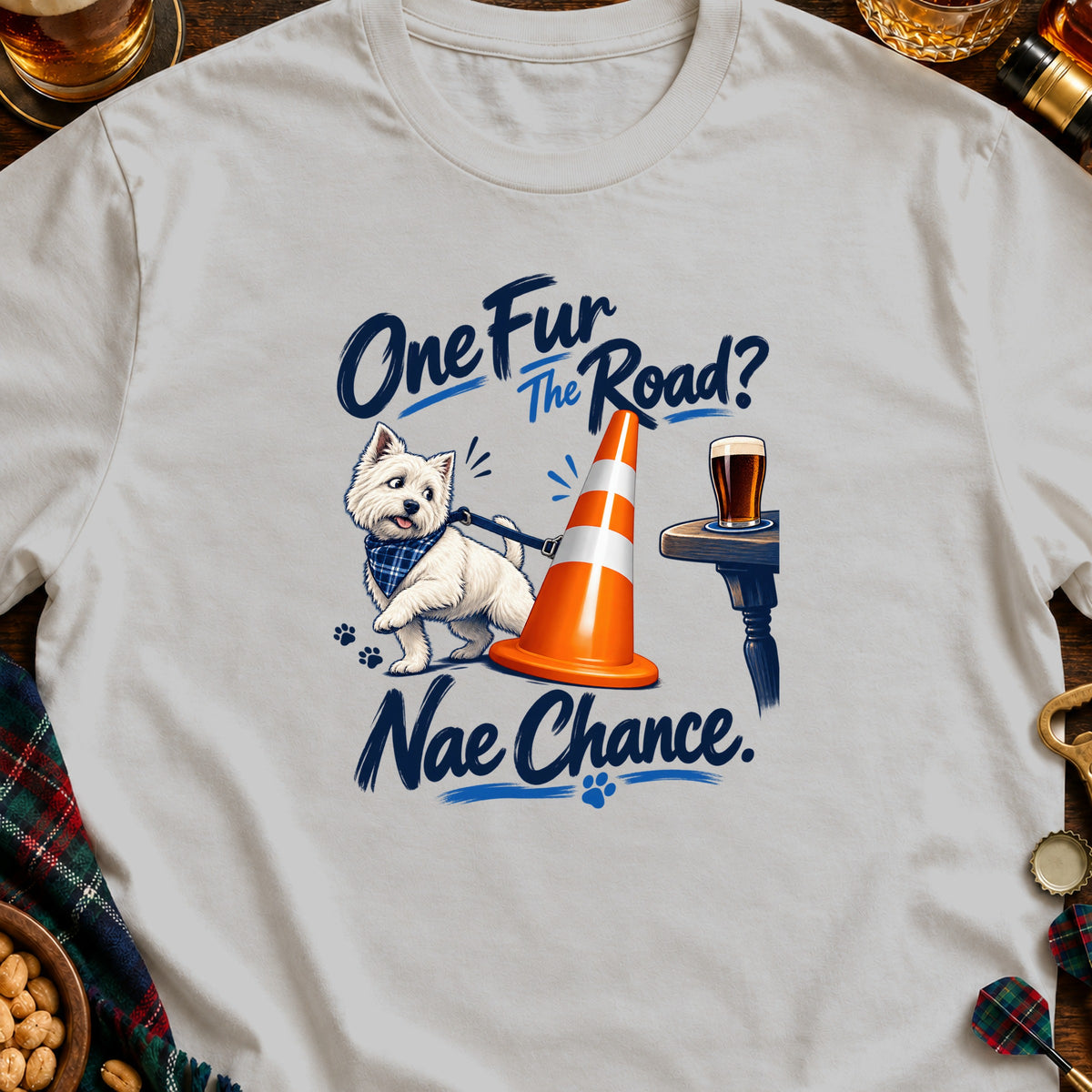 West Highland Terrier with orange cone and text "One Fur The Road? Nae Chance."