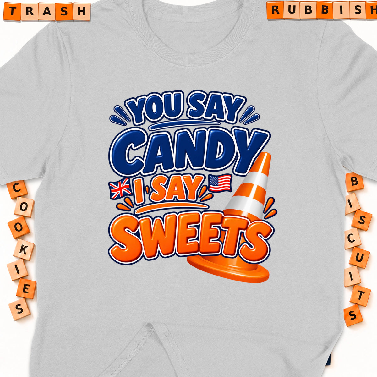 Light gray t-shirt with "You Say Candy, I Say Sweets" graphic and a traffic cone.