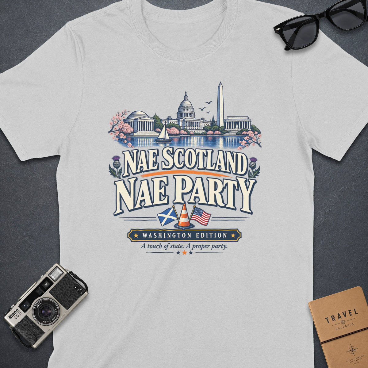 T-shirt graphic with Washington D.C. landmarks and text "Nae Scotland Nae Party".