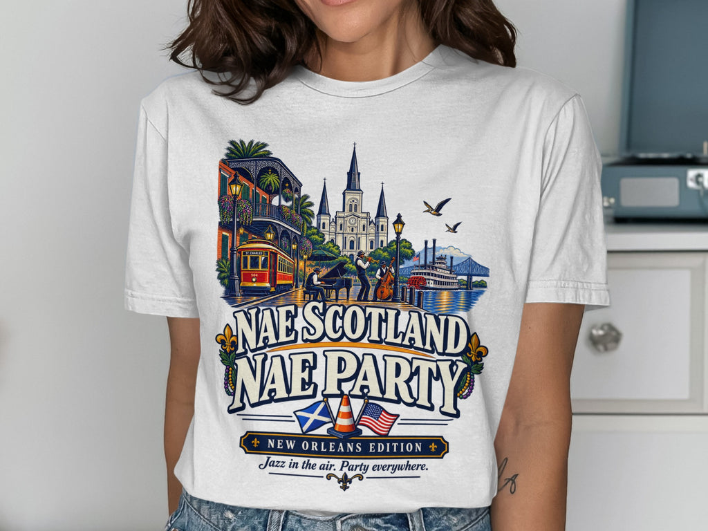 T-shirt with New Orleans jazz scene, streetcar, cathedral, and text "Nae Scotland Nae Party".