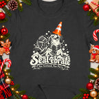 Seal-ebrate graphic with seal wearing party hat and scarf, text reads "Nae Scotland, Nae Party."