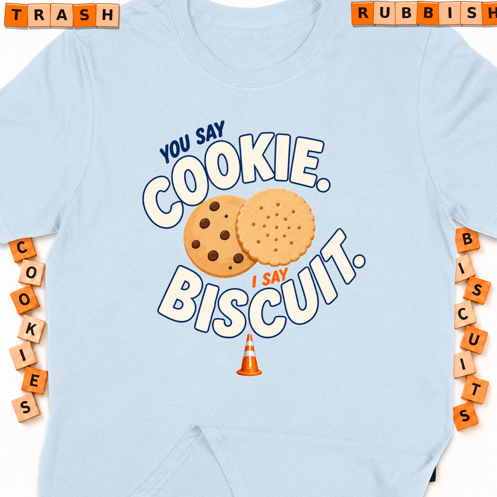 Light blue t-shirt with text "You say cookie, I say biscuit."