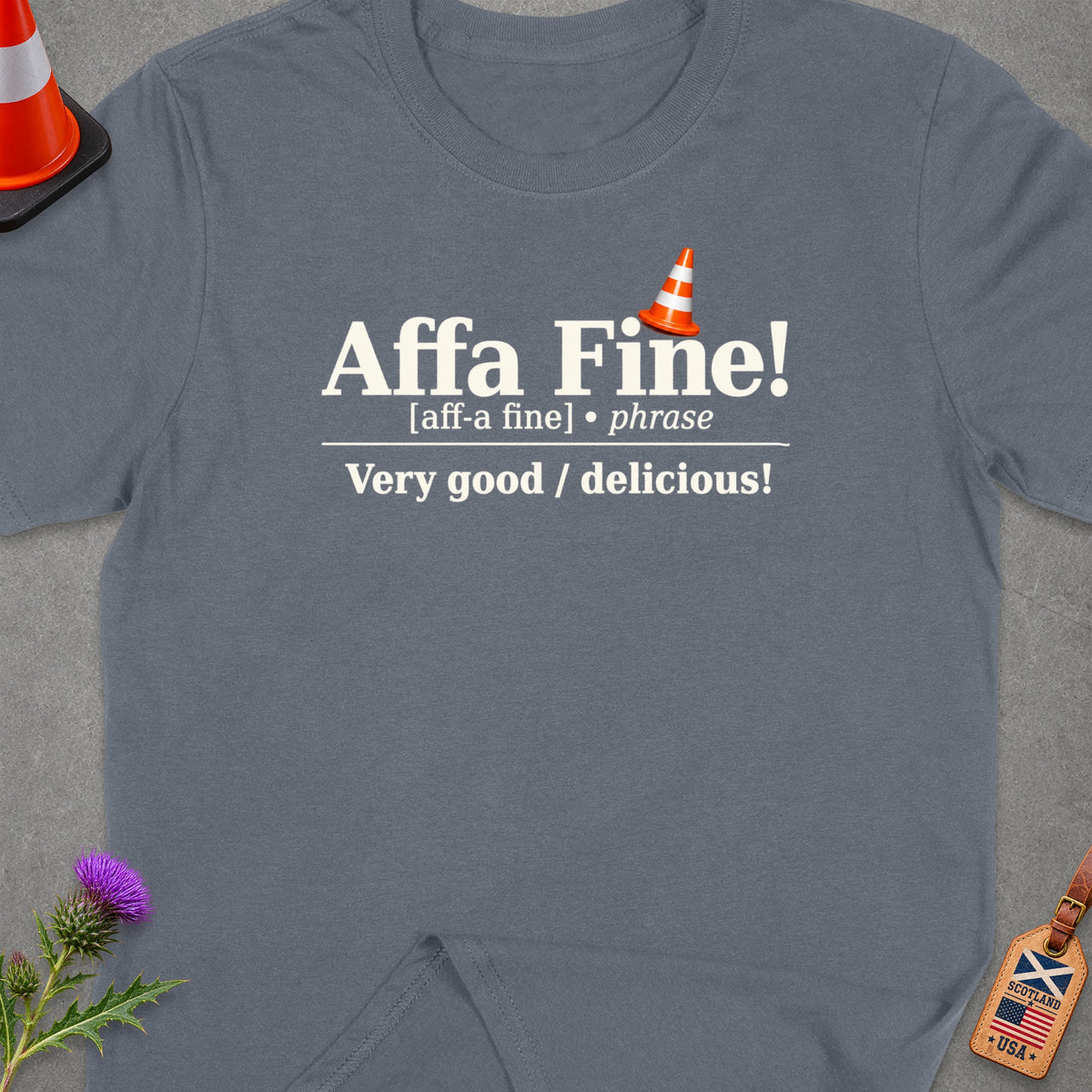Grey t-shirt with "Affa Fine! Very good / delicious!" text.