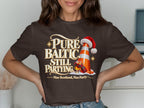 Brown t-shirt with text "Pure Baltic Still Partying. Nae Scotland, Nae Party."