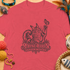Salmon t-shirt with Maine Coon cat graphic and text "PLAYFUL BY NATURE".