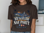 Brown t-shirt with Los Angeles skyline, "Nae Scotland Nae Party" text, and flags.