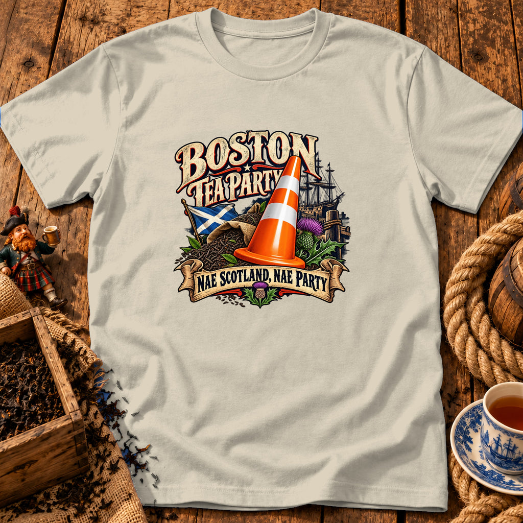 Light beige t-shirt with a Boston Tea Party design featuring a traffic cone, Scottish flag, and ship.