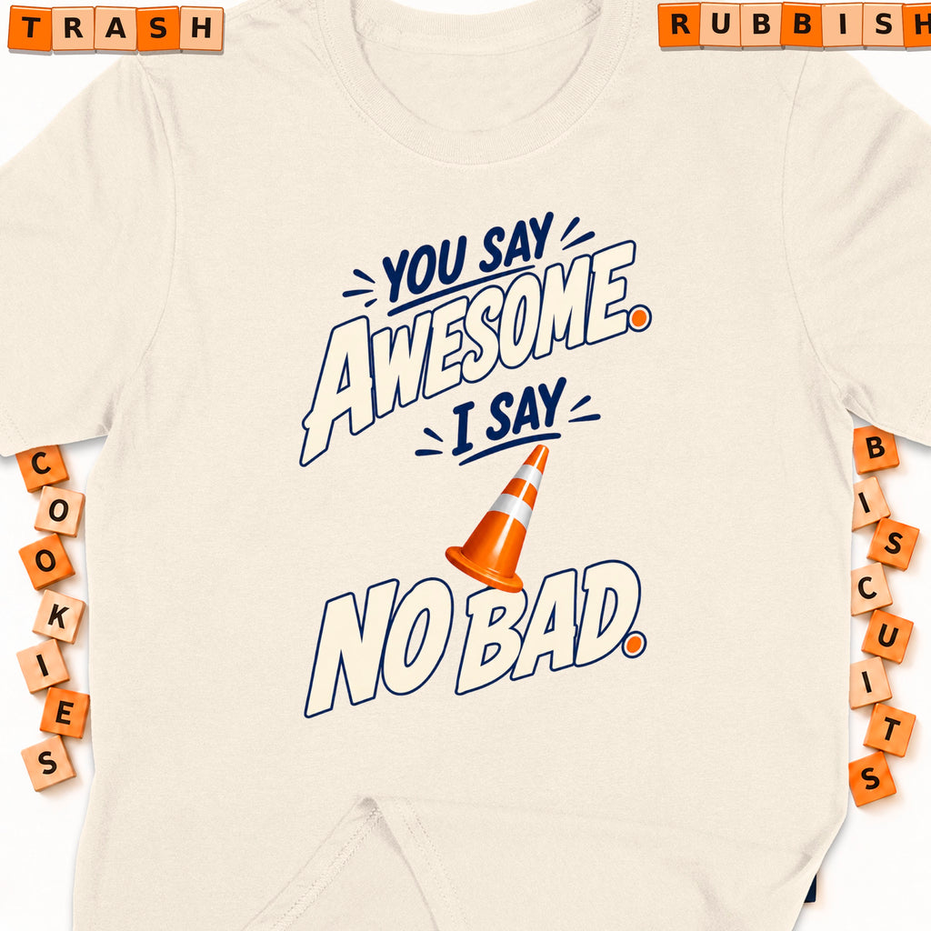 Cream t-shirt with "You Say Awesome, I Say No Bad" graphic and traffic cone.