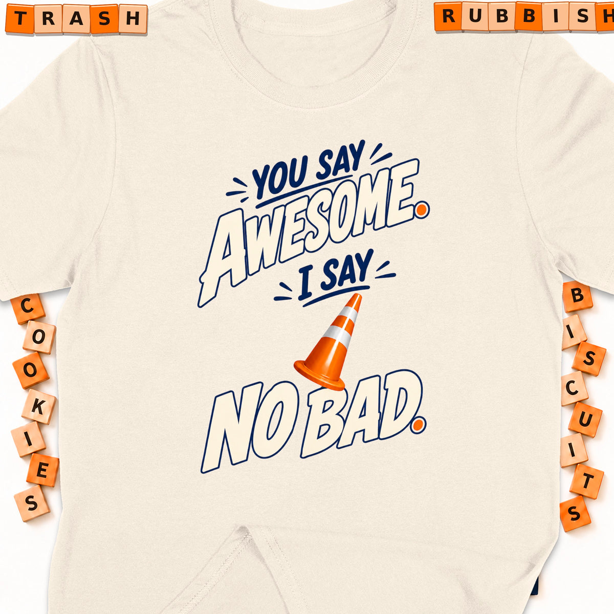 Cream t-shirt with "You Say Awesome, I Say No Bad" graphic and traffic cone.
