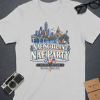 T-shirt graphic with Austin skyline, Scottish and American flags, and text "Nae Scotland Nae Party".