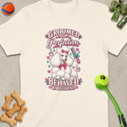 White t-shirt with poodle graphic saying "Groomed to Perfection, Behaved by Accident."
