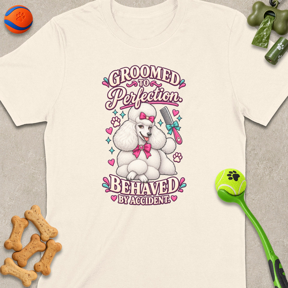 White t-shirt with poodle graphic saying "Groomed to Perfection, Behaved by Accident."