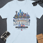 Light blue t-shirt featuring Dallas skyline graphic with text "Nae Scotland Nae Party".