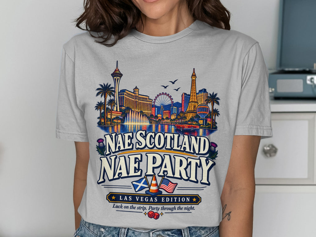 T-shirt graphic: Las Vegas skyline, "Nae Scotland Nae Party," flags, dice.