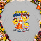 Three chicks celebrate with a traffic cone, text reads "Cracking Good Party" and "Nae Scotland, Nae Party."