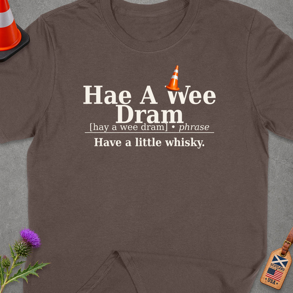 Brown t-shirt with "Hae A wee Dram" and its definition.
