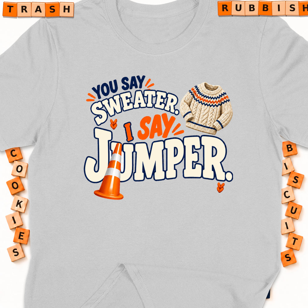 Grey t-shirt with "You say sweater, I say jumper" text and graphics.