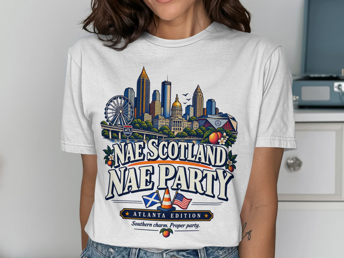 White t-shirt with Atlanta skyline and text "Nae Scotland Nae Party".