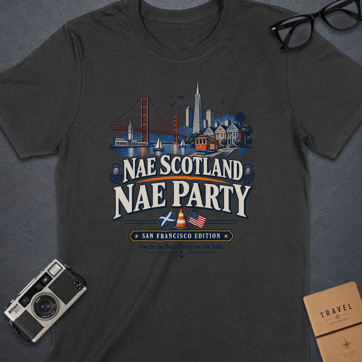 Dark t-shirt with San Francisco skyline, text "Nae Scotland Nae Party".