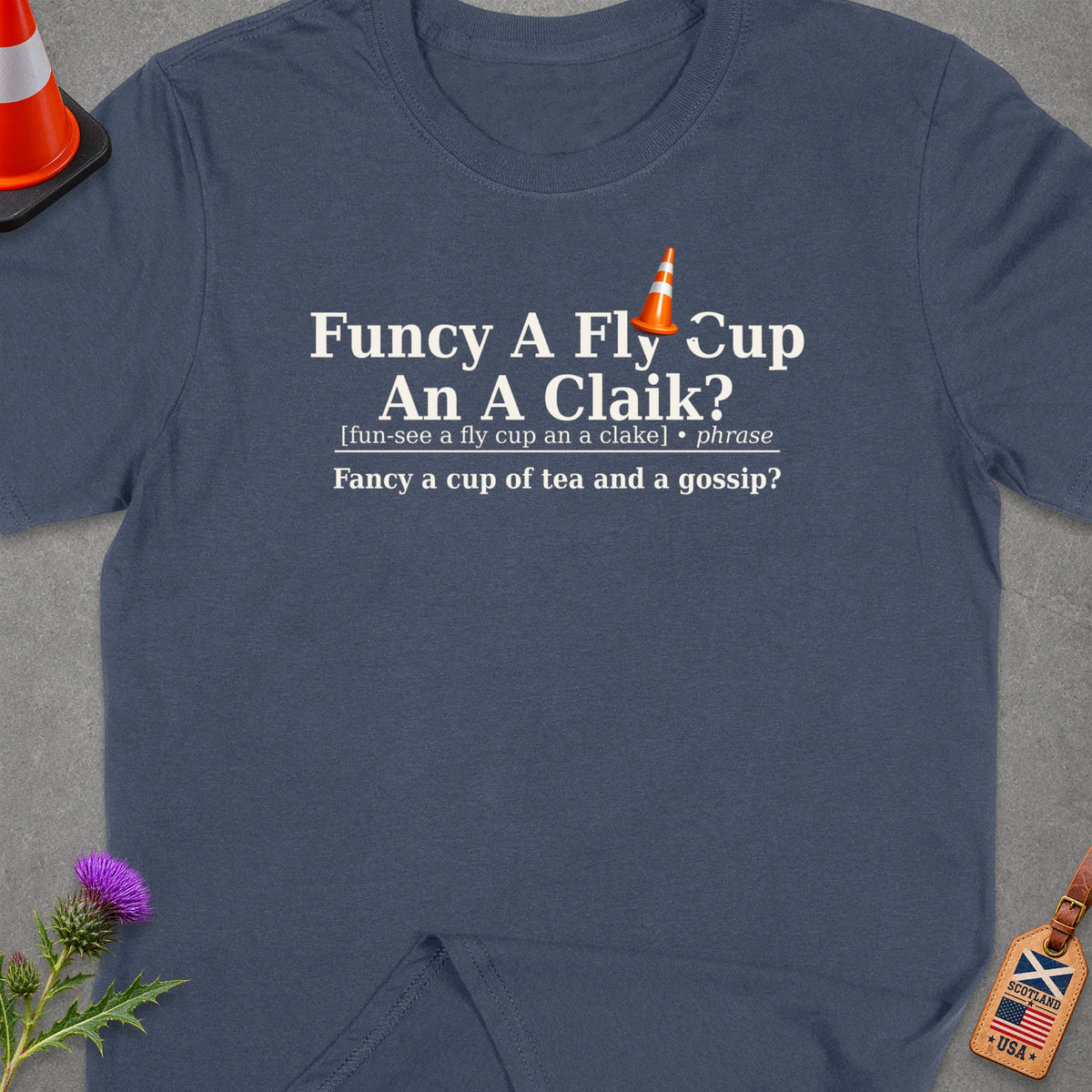 T-shirt with Scottish phrase "Fancy a fly cup an a claik?" meaning tea and gossip.