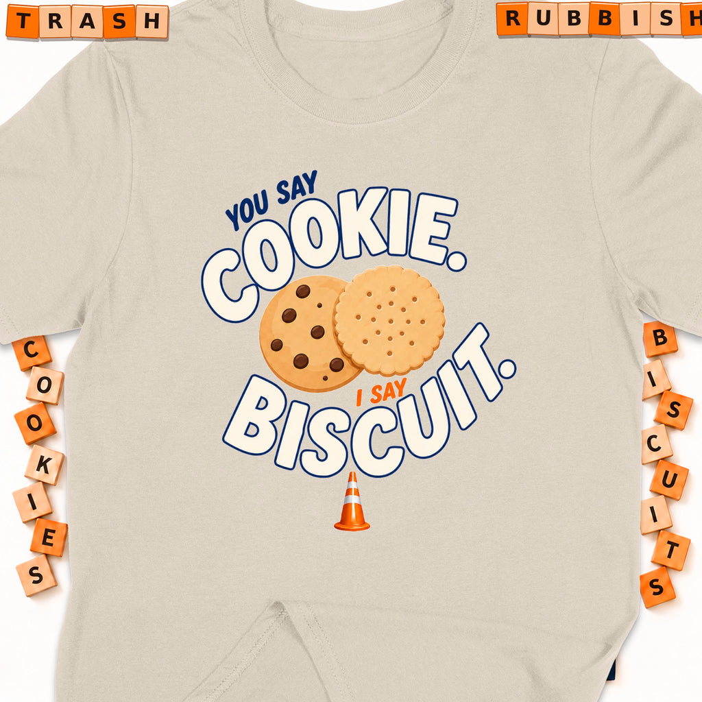 Shirt with "You say cookie, I say biscuit" graphic, cookies, and traffic cone.