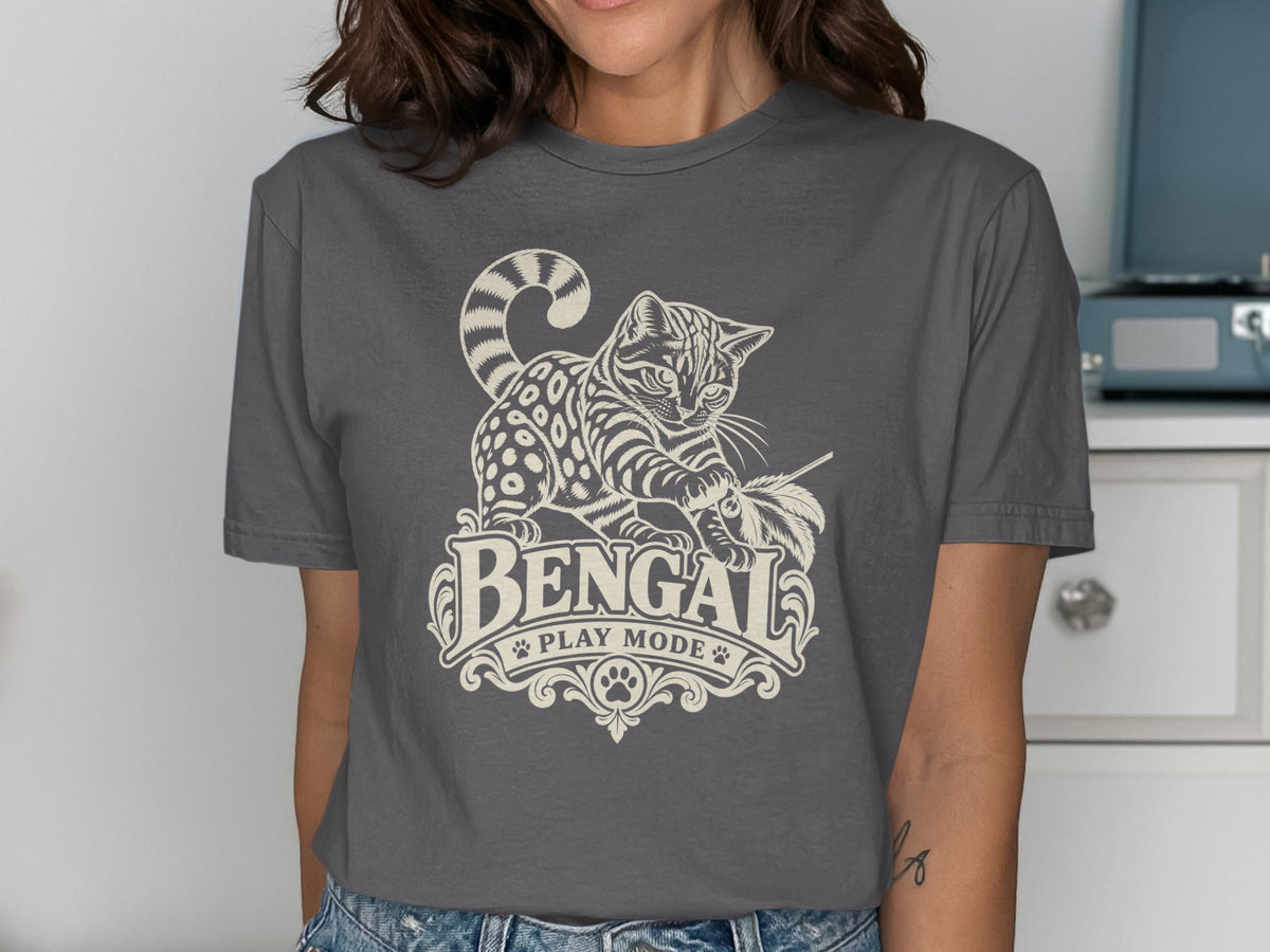 Bengal cat "Play Mode" graphic with text and paw print on a charcoal t-shirt.