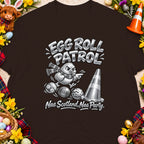 Cartoon chick with scarf, eggs, and traffic cone, saying "Egg Roll Patrol."