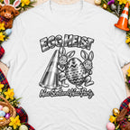 Two cartoon bunnies steal a giant decorated egg next to a cone. "Egg Heist" and "Nae Scotland Nae Party" are written on the shirt.