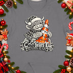 Highland cow with Santa hat and Christmas lights on traffic cone, "CooYears Eve".