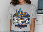 T-shirt graphic: Dallas skyline, cowboy on horse, Scottish thistle, "Nae Scotland Nae Party", "Dallas Edition".