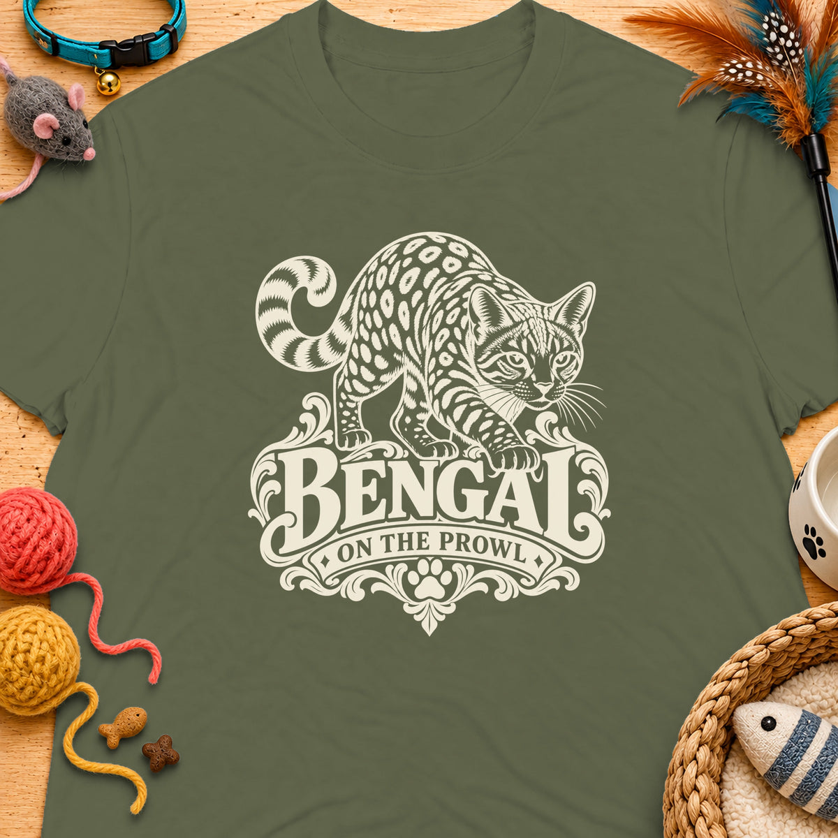 Olive green t-shirt with a cream-colored Bengal cat graphic and text.
