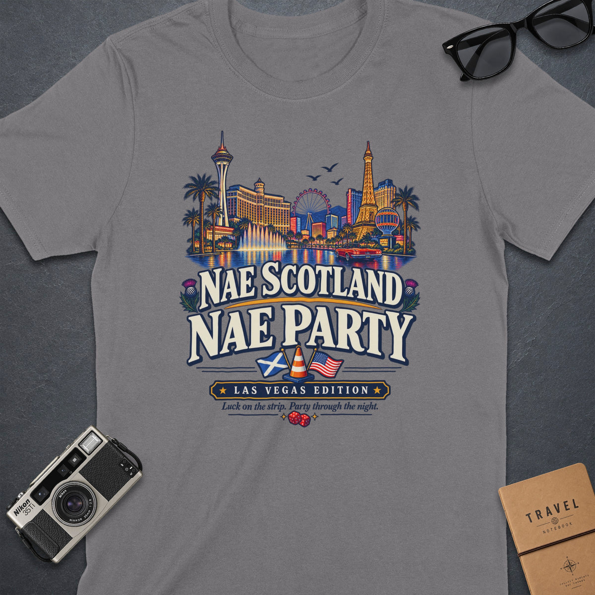 Grey t-shirt with "Nae Scotland Nae Party" text and Las Vegas skyline graphic.