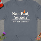 Gray t-shirt with "Nae Bad, Yersel?" text and Scottish/USA flag tag.