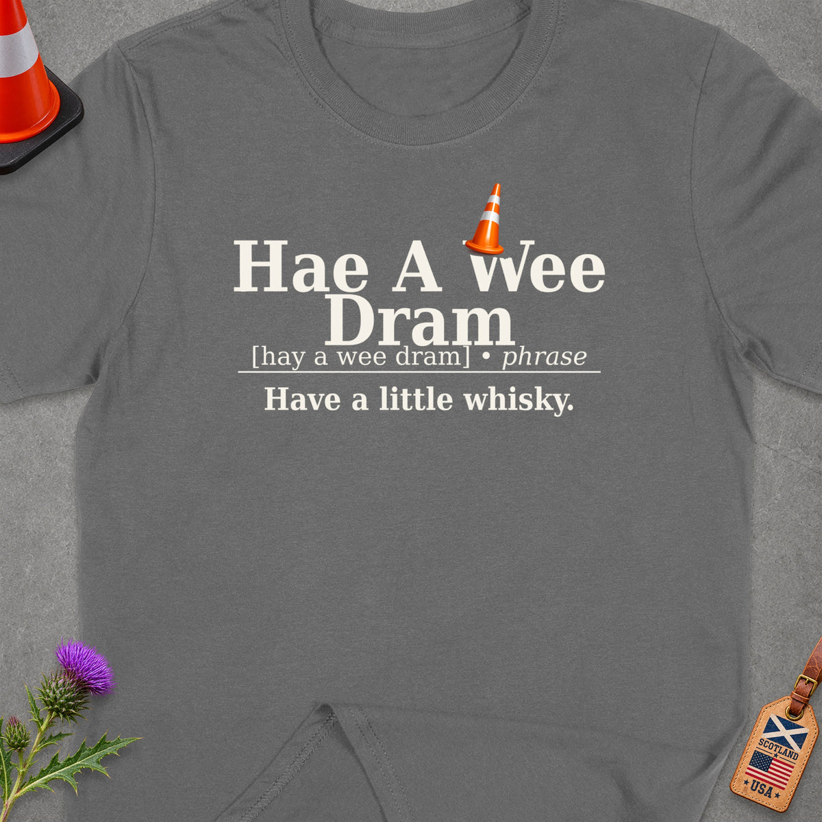 Grey t-shirt with "Hae A Wee Dram" text and a traffic cone icon.
