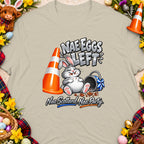 T-shirt with a cartoon bunny surrounded by Easter decorations and text that reads "NAE EGGS LEFT".