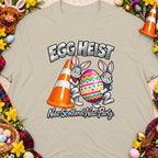 Two rabbits hold a traffic cone and decorated egg with "Egg Heist" text.