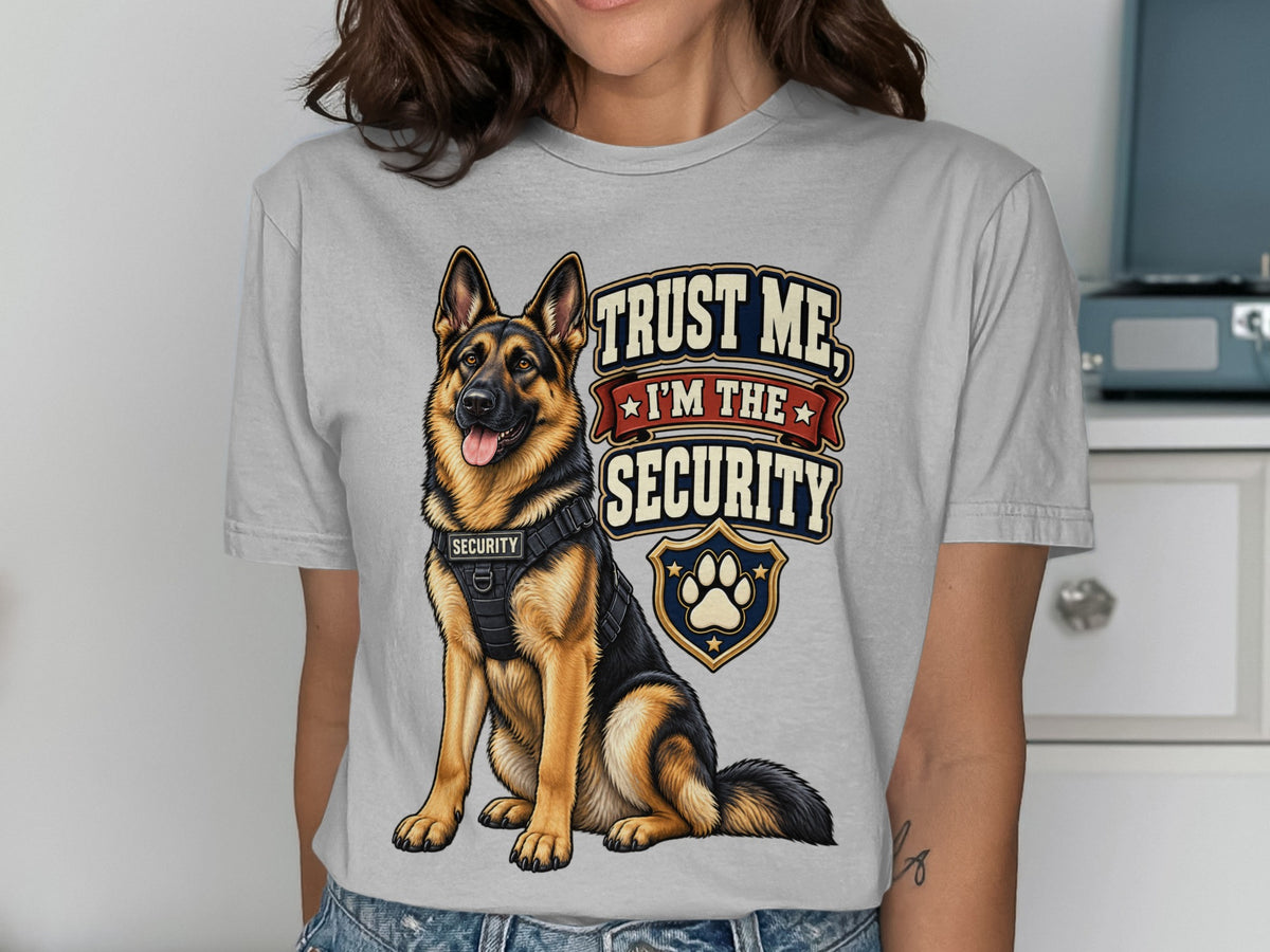 German Shepherd wearing a security vest, "Trust Me, I'm The Security" text.