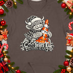 Highland cow in Santa hat hugs traffic cone with lights, "CooYears Eve" text.