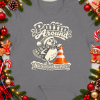 Puffin wearing Santa hat and scarf with "Puffin Around Nae Scotland Nae Party" text.