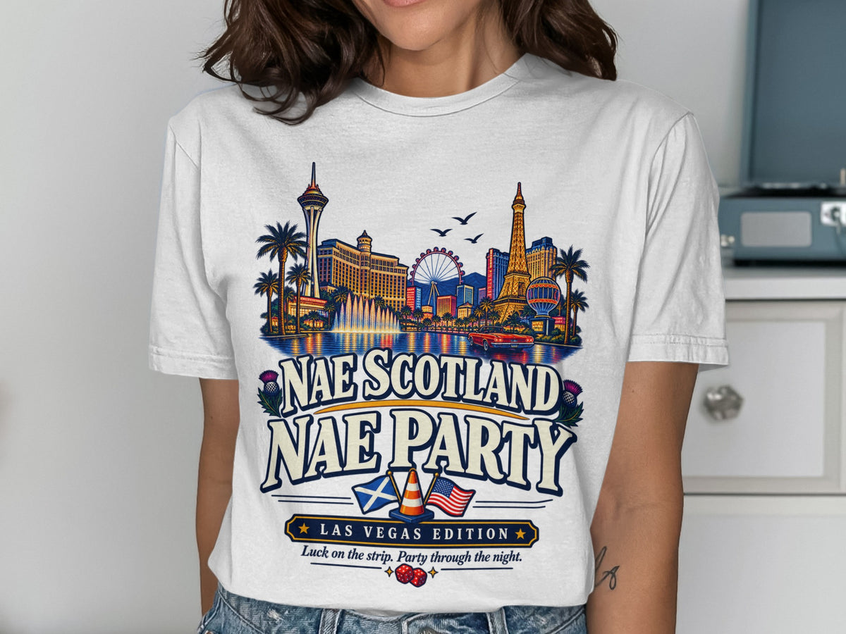 White t-shirt with "Nae Scotland Nae Party Las Vegas Edition" text and Las Vegas landmarks.