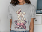 Light gray t-shirt with a white poodle wearing heart sunglasses and a pink bow.
