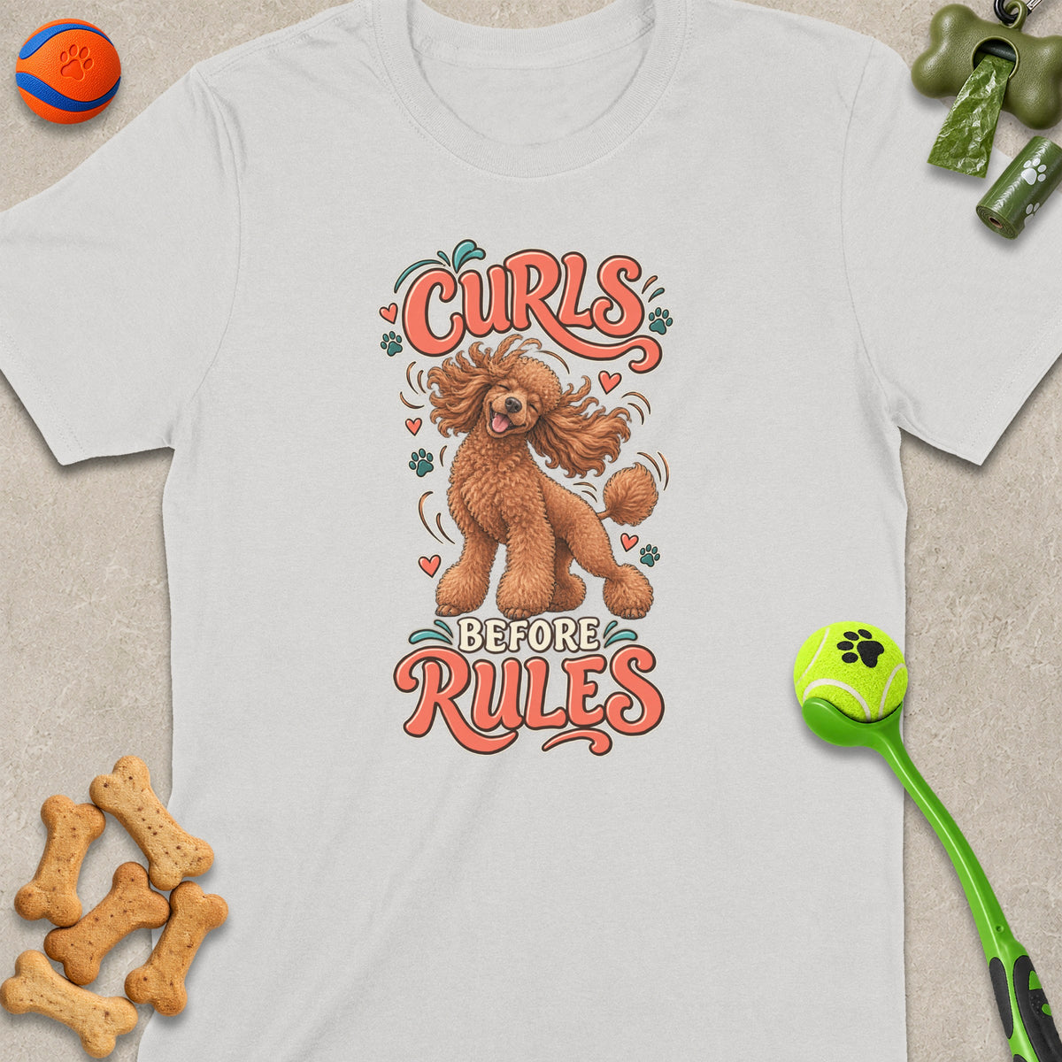 T-shirt with graphic "Curls Before Rules" and a happy poodle illustration.