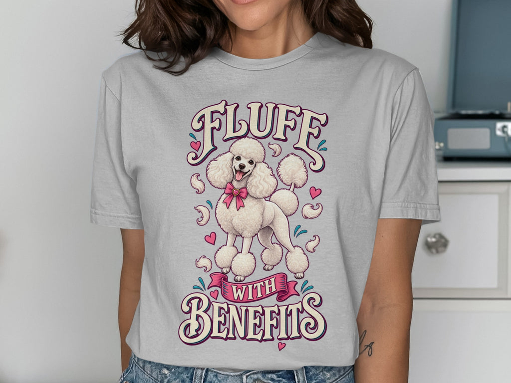 White poodle with pink bow on t-shirt reads "Fluff with Benefits".