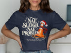 T-shirt with text "Nae Sleigh. Nae Problem!" and a traffic cone with Santa hat.