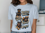 Three Rottweilers depicted with text: Rottie Mode, Protect, Cuddle, Repeat.