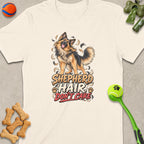 German Shepherd graphic with text "Shepherd Hair Don't Care" on a cream t-shirt.