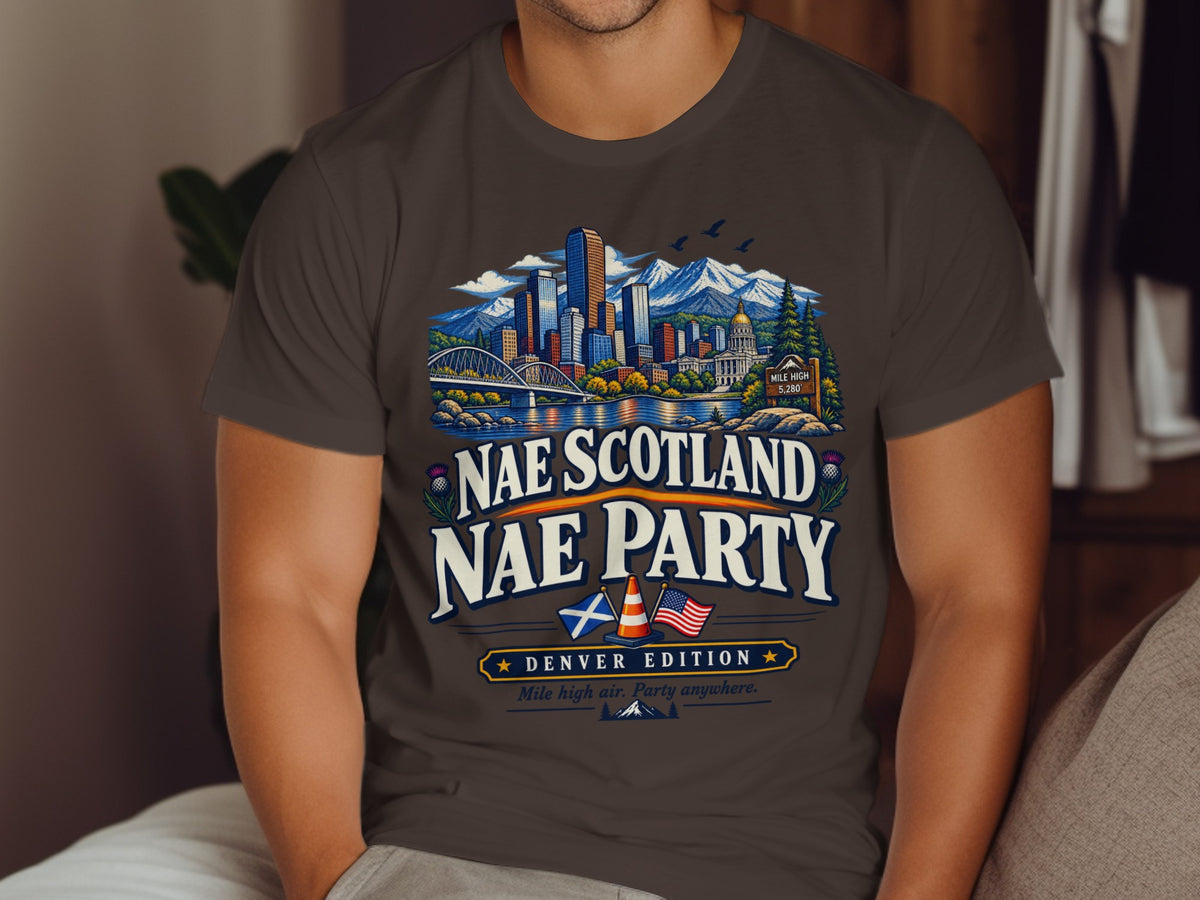 T-shirt with Denver skyline, mountains, Scottish and US flags, and text.