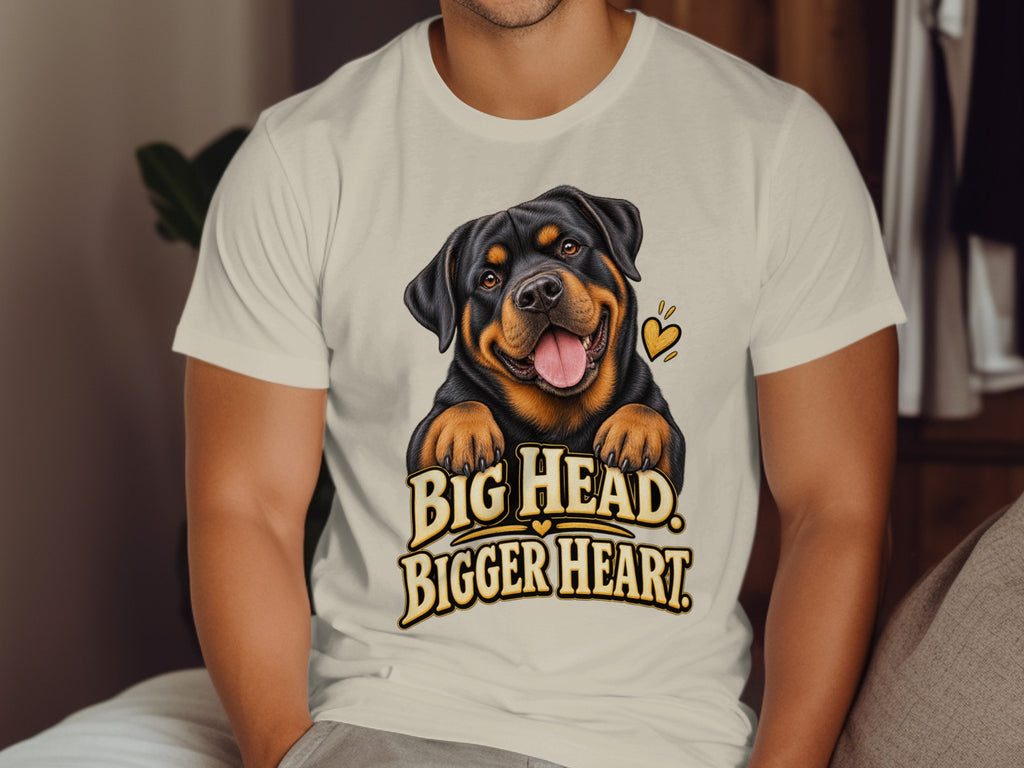 Rottweiler graphic with text "BIG HEAD. BIGGER HEART." on a light t-shirt.