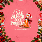 Pink t-shirt with "Nae Sleigh, Nae Problem" text and a traffic cone on a sleigh.